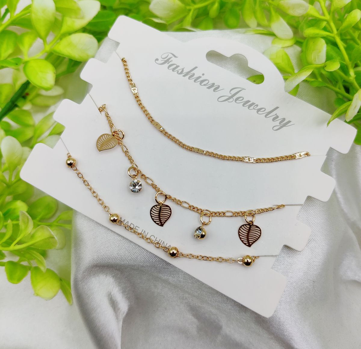 Imported Triple-Layered Adjustable Bracelet Set with Leaf and Crystal Charms