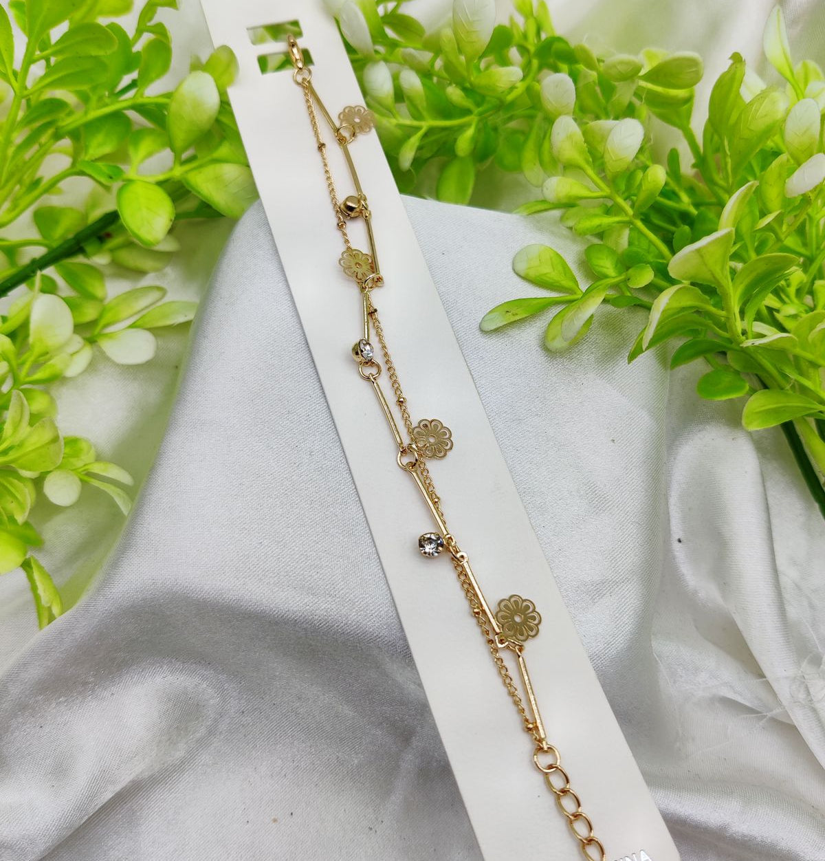 Imported Chic Gold-Plated Adjustable Floral Charm Bracelet – Imported Elegance